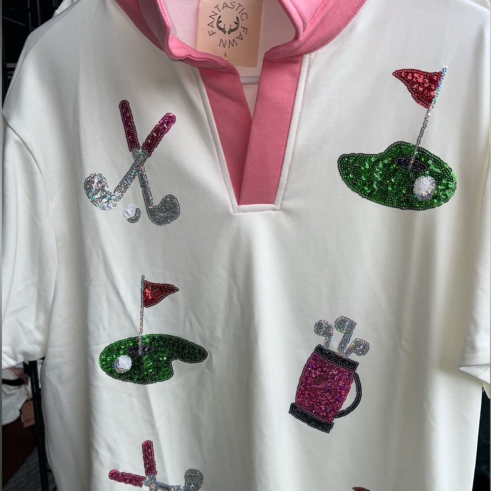 Definitely a hole in one with this cute Sequin golf shirt pink white green